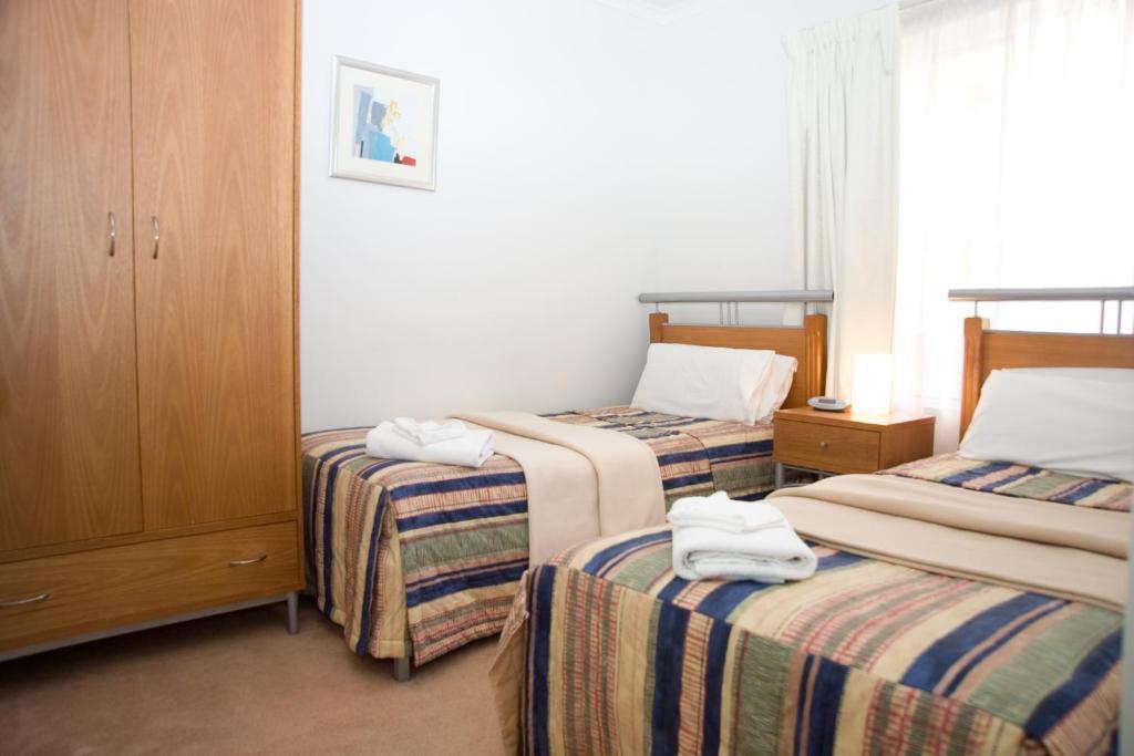 Windsor Apartments Adelaida Habitación foto